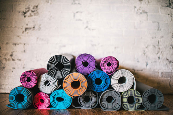How Thick Should a Yoga Mat Be? Tips for Beginners, Knee Problems